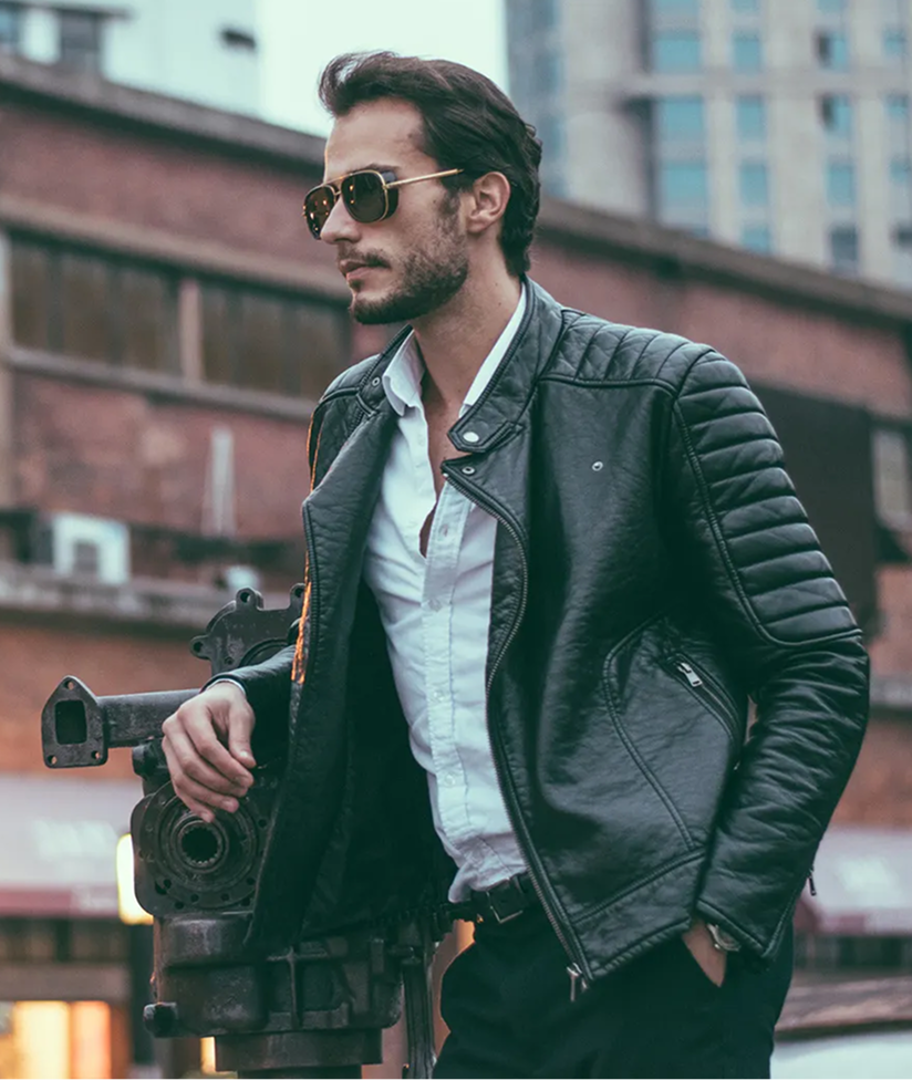Man modelling a black leather jacket